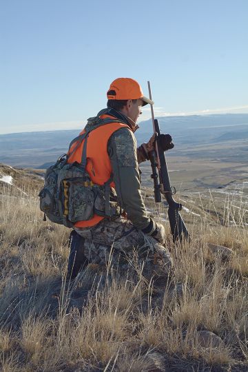 A whitetail approaches a field’s edge from cover. Expect December bucks to be very cautious when using such feed sources.